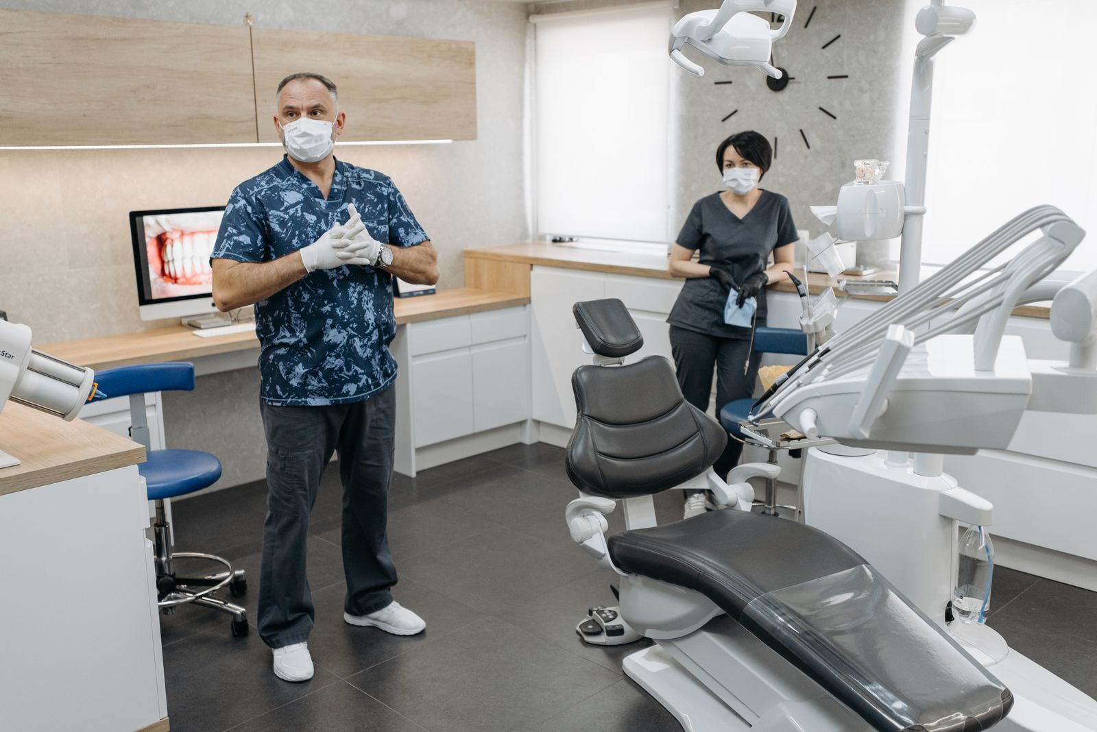 The dental team in a modern, well-equipped operatory